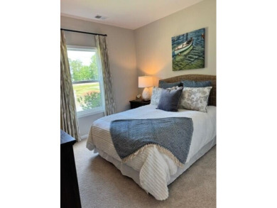 Live the low-maintenance lifestyle in the popular Gwinnett B on Players Course At Wyboo Plantation in South Carolina - for sale on GolfHomes.com, golf home, golf lot