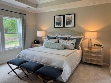 Live the low-maintenance lifestyle in the popular Gwinnett B on Players Course At Wyboo Plantation in South Carolina - for sale on GolfHomes.com, golf home, golf lot