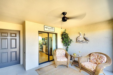 This is the one you've been waiting for! TASTEFULLY DECORATED on Lakewood National Golf Club in Florida - for sale on GolfHomes.com, golf home, golf lot