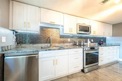 Welcome to this impeccably maintained, move-in-ready 4-bedroom on Beacon Woods Golf Club in Florida - for sale on GolfHomes.com, golf home, golf lot