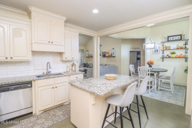 This beautiful 3-bedroom, 2-bathroom split plan home with an on Patrick Farms Golf Club in Mississippi - for sale on GolfHomes.com, golf home, golf lot