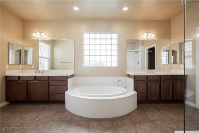 Live a Luxury Lifestyle in Tudor Park at Queensridge. Step into on Badlands Golf Club in Nevada - for sale on GolfHomes.com, golf home, golf lot