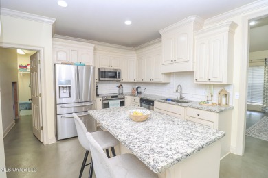 This beautiful 3-bedroom, 2-bathroom split plan home with an on Patrick Farms Golf Club in Mississippi - for sale on GolfHomes.com, golf home, golf lot