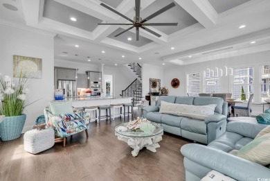 This home is coastal living at his finest. Rising majestically on Myrtlewood Golf Course and Club  in South Carolina - for sale on GolfHomes.com, golf home, golf lot