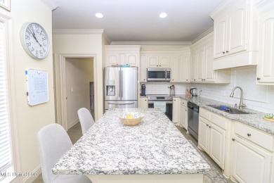 This beautiful 3-bedroom, 2-bathroom split plan home with an on Patrick Farms Golf Club in Mississippi - for sale on GolfHomes.com, golf home, golf lot