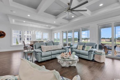 This home is coastal living at his finest. Rising majestically on Myrtlewood Golf Course and Club  in South Carolina - for sale on GolfHomes.com, golf home, golf lot