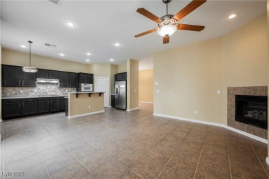 Live a Luxury Lifestyle in Tudor Park at Queensridge. Step into on Badlands Golf Club in Nevada - for sale on GolfHomes.com, golf home, golf lot