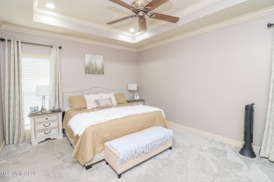 This beautiful 3-bedroom, 2-bathroom split plan home with an on Patrick Farms Golf Club in Mississippi - for sale on GolfHomes.com, golf home, golf lot
