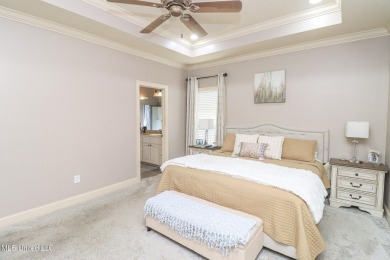 This beautiful 3-bedroom, 2-bathroom split plan home with an on Patrick Farms Golf Club in Mississippi - for sale on GolfHomes.com, golf home, golf lot