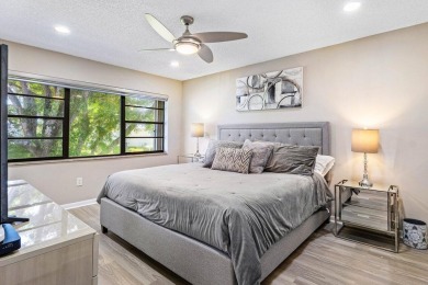 This lavishly remodeled Westgate townhouse boasts two bedrooms on Delray Dunes Golf and Country Club in Florida - for sale on GolfHomes.com, golf home, golf lot