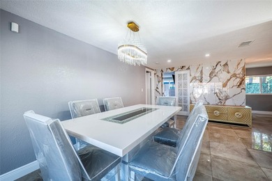 Welcome to this impeccably maintained, move-in-ready 4-bedroom on Beacon Woods Golf Club in Florida - for sale on GolfHomes.com, golf home, golf lot