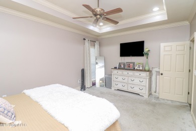 This beautiful 3-bedroom, 2-bathroom split plan home with an on Patrick Farms Golf Club in Mississippi - for sale on GolfHomes.com, golf home, golf lot
