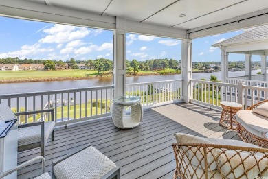 This home is coastal living at his finest. Rising majestically on Myrtlewood Golf Course and Club  in South Carolina - for sale on GolfHomes.com, golf home, golf lot