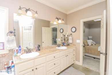 This beautiful 3-bedroom, 2-bathroom split plan home with an on Patrick Farms Golf Club in Mississippi - for sale on GolfHomes.com, golf home, golf lot