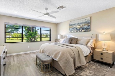 This lavishly remodeled Westgate townhouse boasts two bedrooms on Delray Dunes Golf and Country Club in Florida - for sale on GolfHomes.com, golf home, golf lot