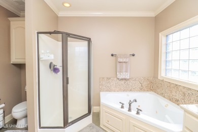 This beautiful 3-bedroom, 2-bathroom split plan home with an on Patrick Farms Golf Club in Mississippi - for sale on GolfHomes.com, golf home, golf lot