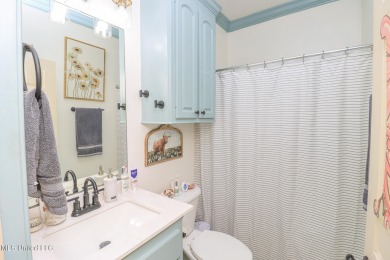 This beautiful 3-bedroom, 2-bathroom split plan home with an on Patrick Farms Golf Club in Mississippi - for sale on GolfHomes.com, golf home, golf lot