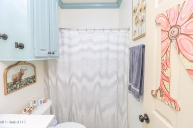 This beautiful 3-bedroom, 2-bathroom split plan home with an on Patrick Farms Golf Club in Mississippi - for sale on GolfHomes.com, golf home, golf lot