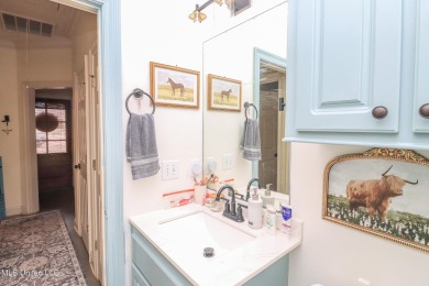 This beautiful 3-bedroom, 2-bathroom split plan home with an on Patrick Farms Golf Club in Mississippi - for sale on GolfHomes.com, golf home, golf lot