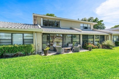 This lavishly remodeled Westgate townhouse boasts two bedrooms on Delray Dunes Golf and Country Club in Florida - for sale on GolfHomes.com, golf home, golf lot