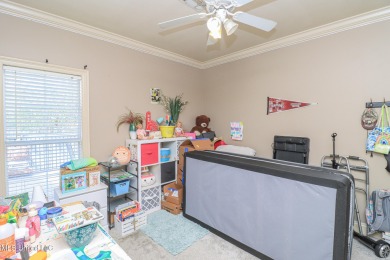 This beautiful 3-bedroom, 2-bathroom split plan home with an on Patrick Farms Golf Club in Mississippi - for sale on GolfHomes.com, golf home, golf lot