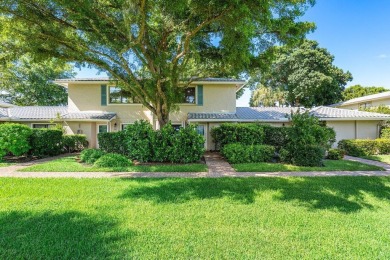 This lavishly remodeled Westgate townhouse boasts two bedrooms on Delray Dunes Golf and Country Club in Florida - for sale on GolfHomes.com, golf home, golf lot