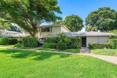 This lavishly remodeled Westgate townhouse boasts two bedrooms on Delray Dunes Golf and Country Club in Florida - for sale on GolfHomes.com, golf home, golf lot