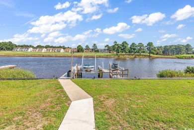 This home is coastal living at his finest. Rising majestically on Myrtlewood Golf Course and Club  in South Carolina - for sale on GolfHomes.com, golf home, golf lot