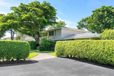 This lavishly remodeled Westgate townhouse boasts two bedrooms on Delray Dunes Golf and Country Club in Florida - for sale on GolfHomes.com, golf home, golf lot