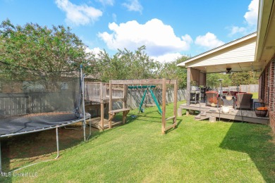 This beautiful 3-bedroom, 2-bathroom split plan home with an on Patrick Farms Golf Club in Mississippi - for sale on GolfHomes.com, golf home, golf lot