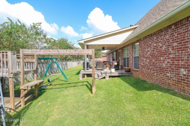 This beautiful 3-bedroom, 2-bathroom split plan home with an on Patrick Farms Golf Club in Mississippi - for sale on GolfHomes.com, golf home, golf lot