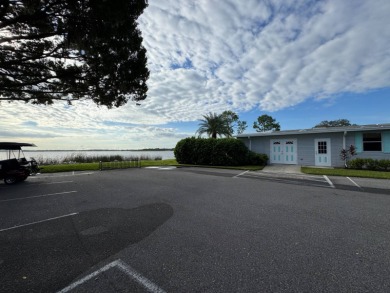 If you are looking for the perfect sanctuary in Central Florida on Lake Henry Golf Club in Florida - for sale on GolfHomes.com, golf home, golf lot