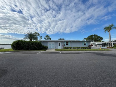 If you are looking for the perfect sanctuary in Central Florida on Lake Henry Golf Club in Florida - for sale on GolfHomes.com, golf home, golf lot