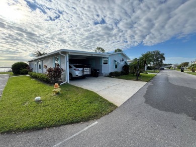 If you are looking for the perfect sanctuary in Central Florida on Lake Henry Golf Club in Florida - for sale on GolfHomes.com, golf home, golf lot