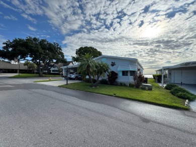If you are looking for the perfect sanctuary in Central Florida on Lake Henry Golf Club in Florida - for sale on GolfHomes.com, golf home, golf lot