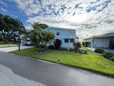 If you are looking for the perfect sanctuary in Central Florida on Lake Henry Golf Club in Florida - for sale on GolfHomes.com, golf home, golf lot