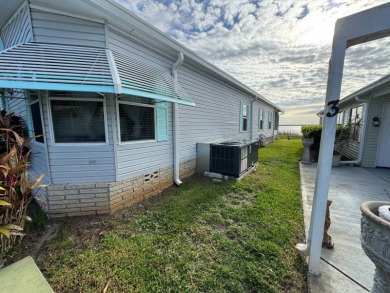 If you are looking for the perfect sanctuary in Central Florida on Lake Henry Golf Club in Florida - for sale on GolfHomes.com, golf home, golf lot