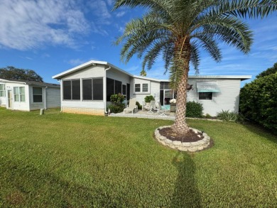 If you are looking for the perfect sanctuary in Central Florida on Lake Henry Golf Club in Florida - for sale on GolfHomes.com, golf home, golf lot