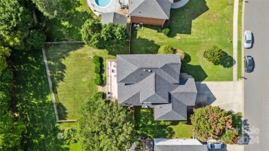 Welcome to this RARE 3-car garage home with stunning LAKE/POND on Highland Creek Golf Club in North Carolina - for sale on GolfHomes.com, golf home, golf lot