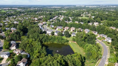 Welcome to this RARE 3-car garage home with stunning LAKE/POND on Highland Creek Golf Club in North Carolina - for sale on GolfHomes.com, golf home, golf lot