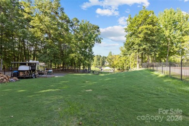 Welcome to this RARE 3-car garage home with stunning LAKE/POND on Highland Creek Golf Club in North Carolina - for sale on GolfHomes.com, golf home, golf lot