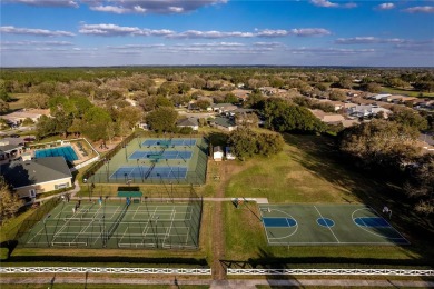 Tucked within the prestigious guard-gated Silverthorn Golf on Silverthorn Country Club in Florida - for sale on GolfHomes.com, golf home, golf lot