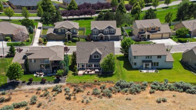 You'll fall in love with this 2-story custom home perched above on Horn Rapids Golf Club in Washington - for sale on GolfHomes.com, golf home, golf lot