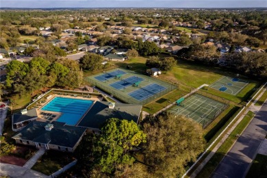 Tucked within the prestigious guard-gated Silverthorn Golf & on Silverthorn Country Club in Florida - for sale on GolfHomes.com, golf home, golf lot