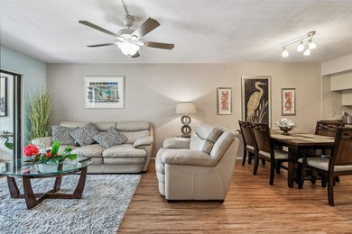 Beautifully Furnished (optional) 2-Bed/2-Bath Ground-Floor Condo on University Park Country Club in Florida - for sale on GolfHomes.com, golf home, golf lot