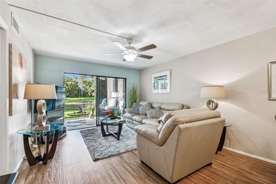 Beautifully Furnished (optional) 2-Bed/2-Bath Ground-Floor Condo on University Park Country Club in Florida - for sale on GolfHomes.com, golf home, golf lot