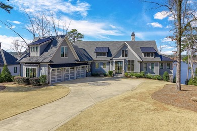 Discover luxurious lakefront living at its finest with this on Reynolds Lake Oconee - The Oconee in Georgia - for sale on GolfHomes.com, golf home, golf lot