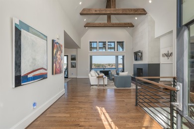 Discover luxurious lakefront living at its finest with this on Reynolds Lake Oconee - The Oconee in Georgia - for sale on GolfHomes.com, golf home, golf lot