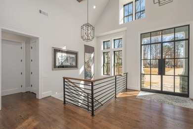 Discover luxurious lakefront living at its finest with this on Reynolds Lake Oconee - The Oconee in Georgia - for sale on GolfHomes.com, golf home, golf lot