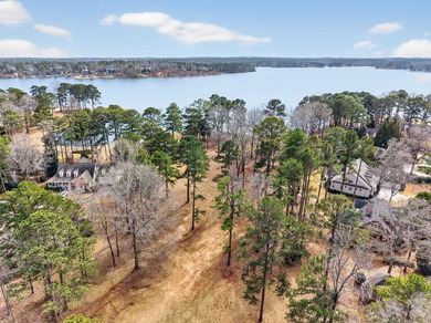 LAKE VIEWS AND A PREMIER GREAT WATERS LOCATION PRESENT AN on Great Waters Course At Reynolds Plantation in Georgia - for sale on GolfHomes.com, golf home, golf lot